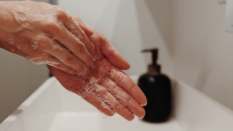 Scrubbing and washing hands in sink | Contamination OCD Comprehensive Insights and 5 Strategies for Better Management | Mindful Health Solutions